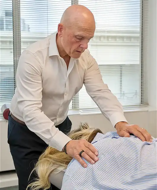 Applying gentle Chiropractic adjustment