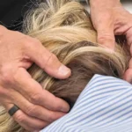 Close up shot of chiropractor applying a Occipital Fibre Analysis